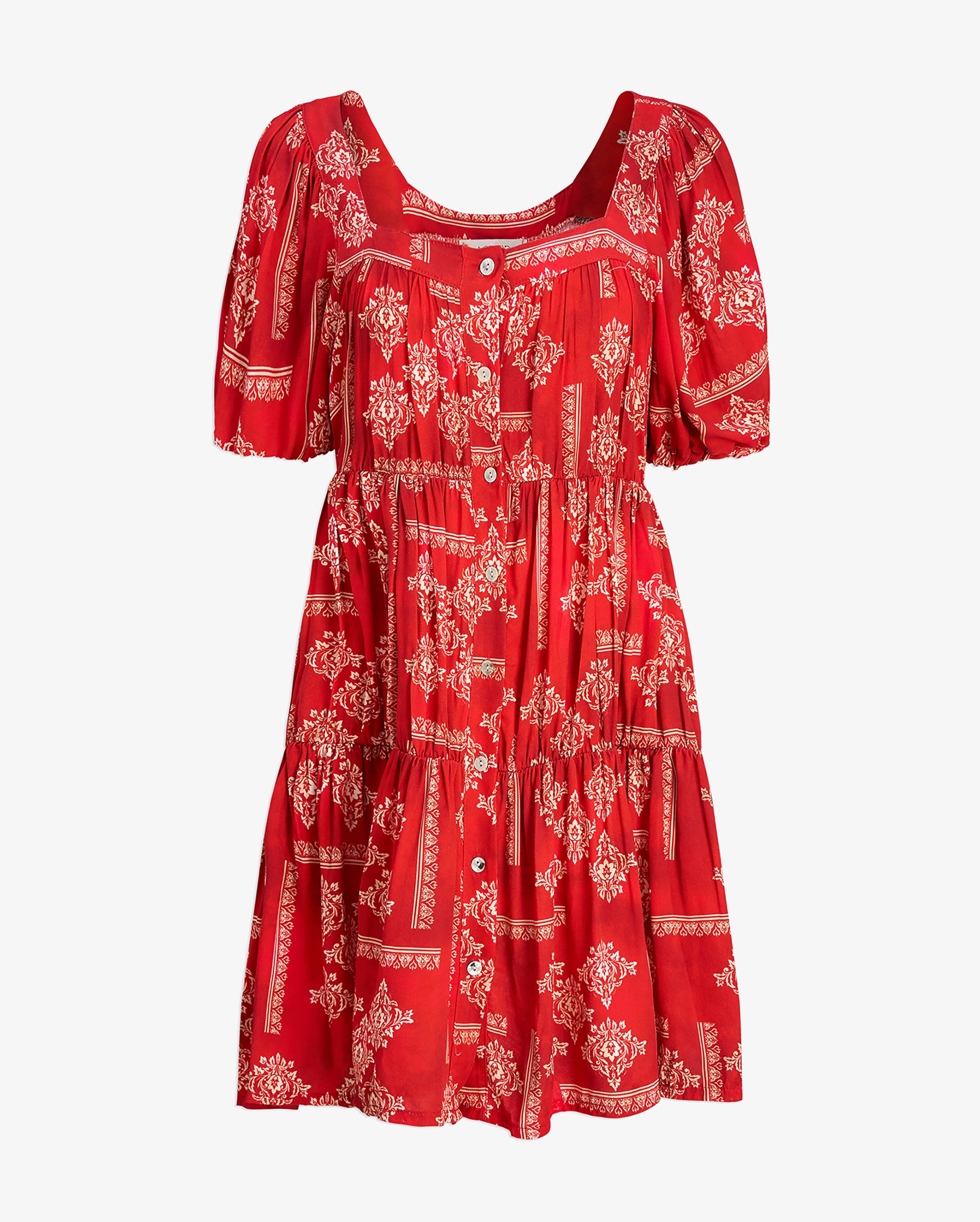 Red dress with white pattern on a light gray background